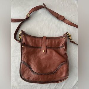 Frye Madison North South cognac reddish-brown leather crossbody shoulder bag.